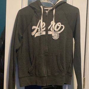 I’m selling a size small gray and white zips up hoodie